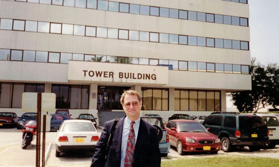Photo of attorney Mark Yost in front of DOJ building in the Cayman Islands